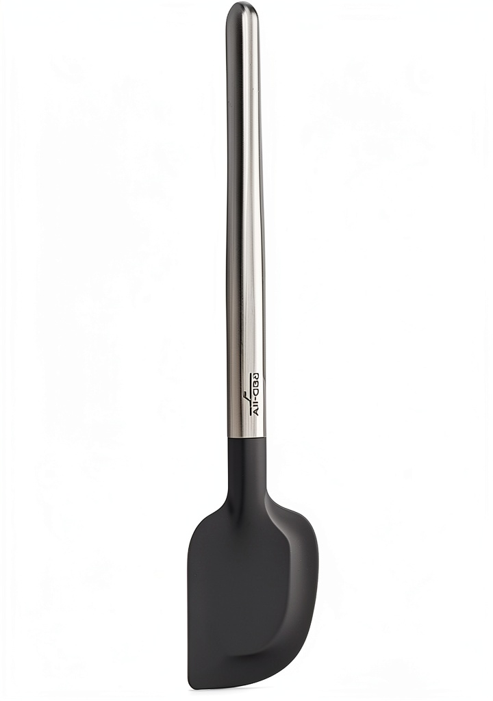 All-Clad stainless steel spatula with flexible silicone head resting on a wooden cutting board